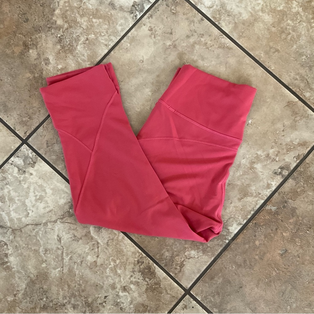 Women’s pink Lululemon leggings